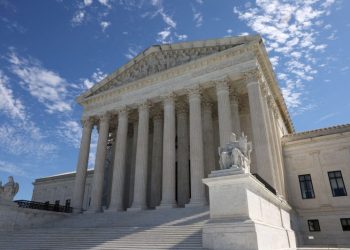 Supreme Court, under pressure, issues ethics code specific to justices