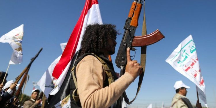 Who are the Houthi rebels attacking commercial ships in the Middle East?