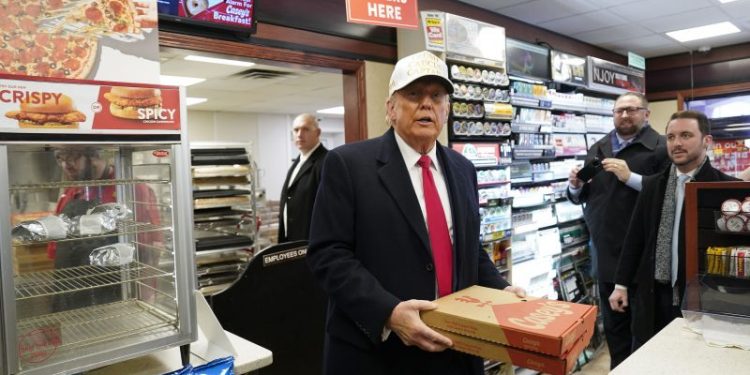 Trump-dominated Iowa race barrels to contentious finish in frigid weather