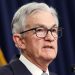 Federal Reserve holds interest rates steady as consumer confidence improves and inflation slows