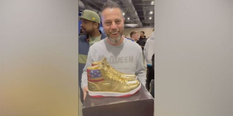 CEO wins autographed golden Donald Trump sneakers after $9K bid