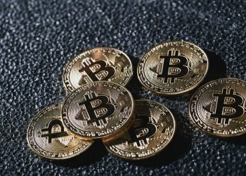 Bitcoin Hits $46K, ETFs Break Records Amid Economic Caution