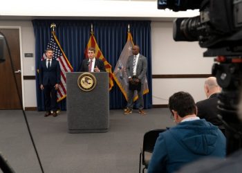 Federal officials say 20 have been charged for threatening election workers