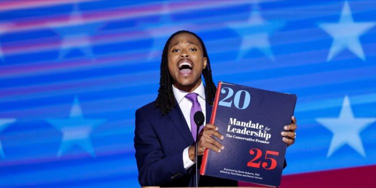 Democrats use oversize text of Project 2025 to warn of Trump, GOP agenda