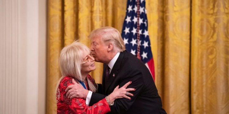 Trump draws a parallel between a campaign donor and war heroes