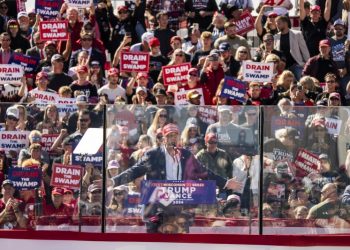 Trump dismisses new warnings of Russian interference in election