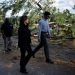 Biden and Harris visit storm-ravaged areas