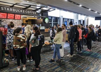 Can Starbucks fix long lines at its airport cafes?