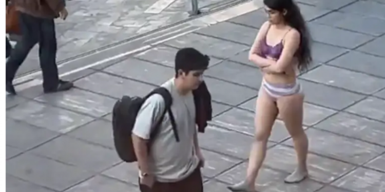 Iranian woman strips down in anti-hijab protest following vicious assault by regime militia