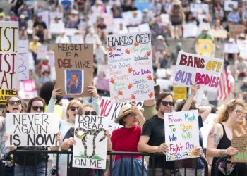 Federal judge partially blocks Trump’s effort to deny funding to pro-DEI public schools